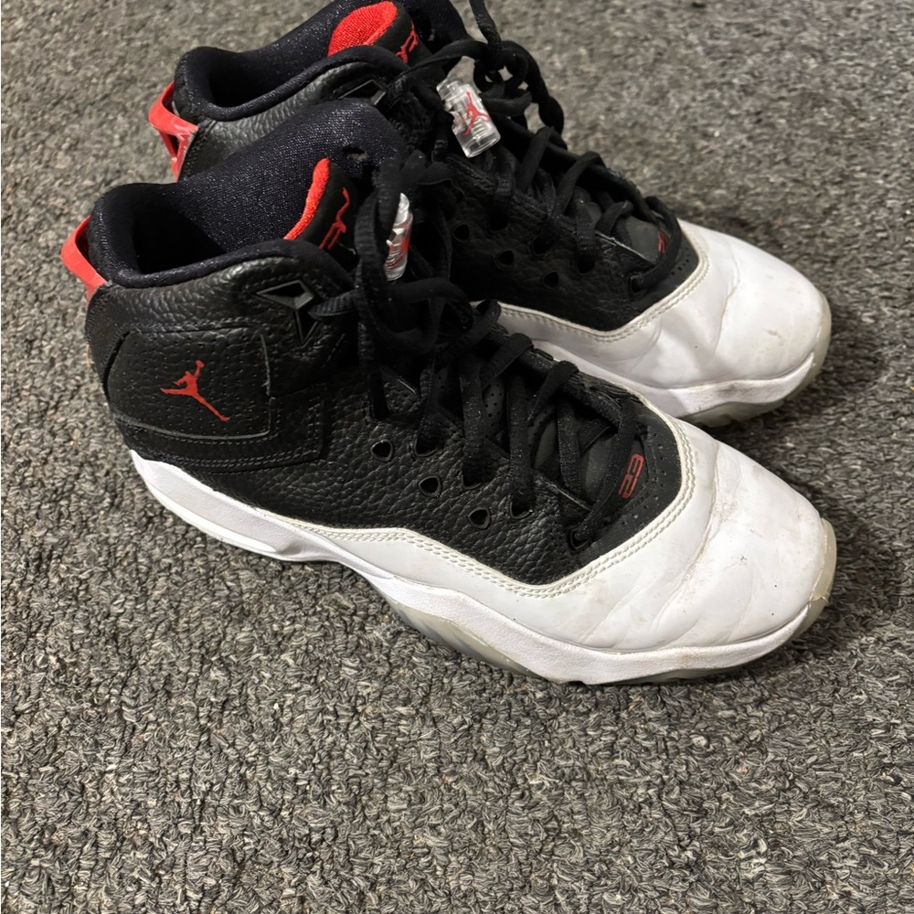 Jordan Kids Black and White Sneakers with Red Accents